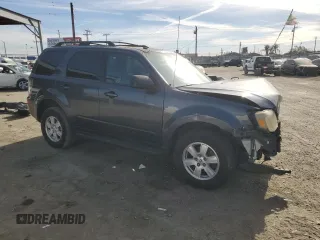 2010 Mercury Mariner with VIN 4M2CN8B75AKJ05043, listed as a Copart auction lot 42630505 with 154,741 mi miles and Salvage title. Bid and sale history available at DreamBid. Image 4.