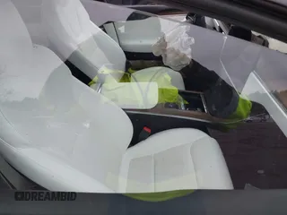 2022 Tesla Model X with VIN 7SAXCBE57NF354843, listed as a IAAI auction lot 41027188 with Not Provided miles and . Bid and sale history available at DreamBid. Image 5.