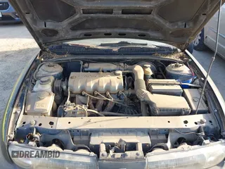 1996 Saturn SL with VIN 1G8ZF5289TZ265189, listed as a IAAI auction lot 41618552 with 264,742 mi miles. Bid and sale history available at carsss.com. Image 10.
