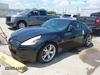 2012 Nissan 370Z z VIN JN1AZ4EH1CM564630, wystawiony jako IAAI lot #42177880 z przebiegiem 173 751 mil mil oraz . Historia ofert i sprzedaży dostępna na DreamBid. Obrazek 18.