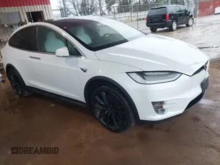 2021 Tesla Model X Long Range Plus with VIN 5YJXCDE25MF322485, listed as a IAAI auction lot 41560822 with Not Provided miles and . Bid and sale history available at carsss.com. Image 1.