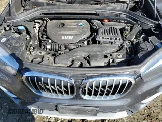 2018 BMW X1 xDrive28i with VIN WBXHT3C30J5K27472, listed as a Copart auction lot 52106655 with 120,936 mi miles and Clean Title. Bid and sale history available at carsss.com. Image 12.