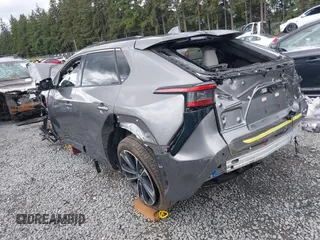 2023 Toyota bZ4X XLE z VIN JTMABACA2PA035359, wystawiony jako IAAI lot #42250768 z przebiegiem 8 197 mil mil oraz . Historia ofert i sprzedaży dostępna na DreamBid. Obrazek 3.