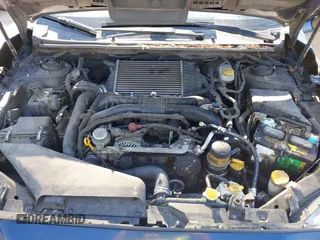 2015 Subaru WRX with VIN JF1VA1A64F9812603, listed as a IAAI auction lot 42012048 with 131,899 mi miles. Bid and sale history available at carsss.com. Image 10.