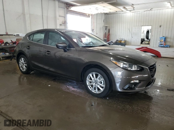 2015 Mazda 3 i Grand Touring with VIN JM1BM1M75F1231814, listed as a Copart auction lot 62692695 with 49,253 mi miles and Salvage title. Bid and sale history available at DreamBid. Image 4.