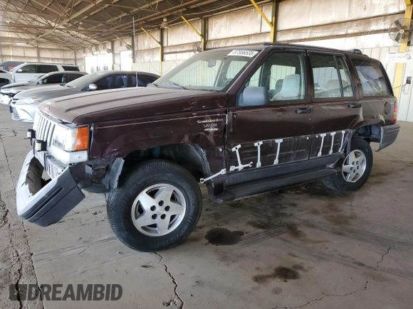1995 Jeep Grand Cherokee Laredo with VIN 1J4GZ58S1SC704775, listed as a Copart auction lot 87556535 with 266,365 mi miles and Salvage title. Bid and sale history available at DreamBid. Image 1.
