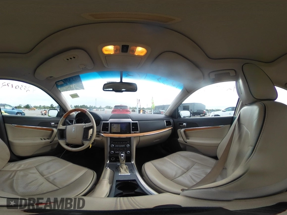 2010 Lincoln MKZ z VIN 3LNHL2GC2AR636552, wystawiony jako IAAI lot #42330172 z przebiegiem 98 883 mil mil oraz . Historia ofert i sprzedaży dostępna na DreamBid. Obrazek 22.