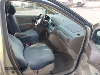 2002 Toyota Sienna LE with VIN 4T3ZF13C82U457803, listed as a IAAI auction lot 41198246 with 185,445 mi miles and . Bid and sale history available at DreamBid. Image 5.