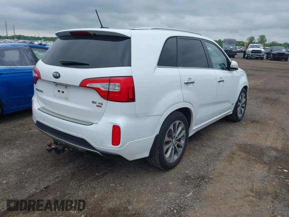 2014 Kia Sorento SX z VIN 5XYKWDA71EG520204, wystawiony jako IAAI lot #42388830 z przebiegiem 193 262 mil mil oraz . Historia ofert i sprzedaży dostępna na DreamBid. Obrazek 4.