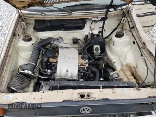 1982 Volkswagen Rabbit z VIN 1V1KG0175CV012235, wystawiony jako Copart lot #86112834 z przebiegiem 186 959 mil mil oraz Szkody całkowita. Historia ofert i sprzedaży dostępna na DreamBid. Obrazek 11.