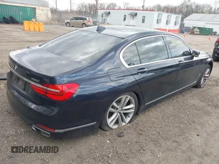 2016 BMW 7 Series 750i xDrive with VIN WBA7F2C58GG418482, listed as a IAAI auction lot 41931831 with 97,776 mi miles and . Bid and sale history available at DreamBid. Image 4.