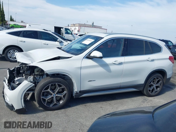 2018 BMW X1 xDrive28i with VIN WBXHT3C37J5K28375, listed as a IAAI auction lot 42039336 with 28,664 mi miles. Bid and sale history available at carsss.com. Image 14.