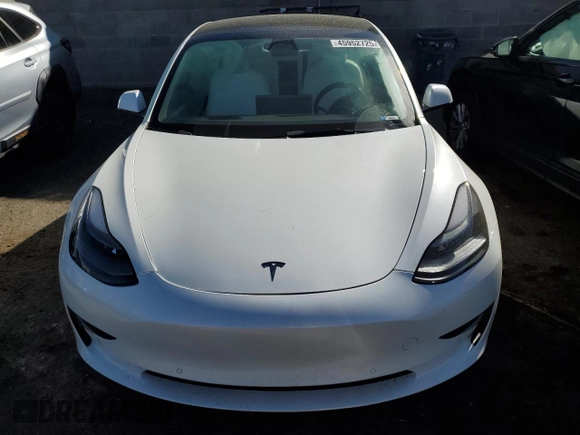 2022 Tesla Model 3 Long Range with VIN 5YJ3E1EB4NF249277, listed as a Copart auction lot 45952725 with Not Provided miles and Salvage Title. Bid and sale history available at DreamBid. Image 5.