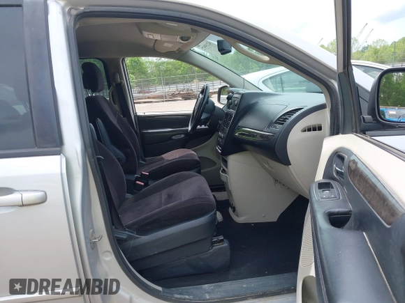 2011 Dodge Grand Caravan SXT with VIN 2D4RN4DGXBR600799, listed as a IAAI auction lot 42159972 with 257,571 mi miles and . Bid and sale history available at DreamBid. Image 5.