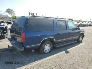 1999 Chevrolet Suburban with VIN 3GNEC16RXXG254126, listed as a Copart auction lot 52051405 with 113,554 mi miles and Clean title. Bid and sale history available at DreamBid. Image 3.