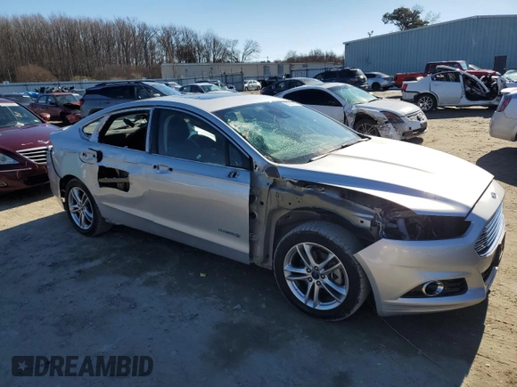 2016 Ford Fusion Titanium Hybrid with VIN 3FA6P0RU9GR387322, listed as a Copart auction lot 88020165 with 142,075 mi miles and Clean Title. Bid and sale history available at carsss.com. Image 4.