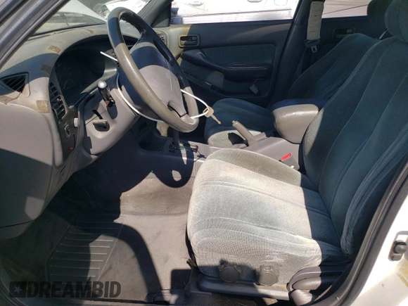 1992 Toyota Camry LE with VIN 4T1SK12E0NU077223, listed as a Copart auction lot 71787194 with 239,027 mi miles and Salvage Title. Bid and sale history available at carsss.com. Image 7.