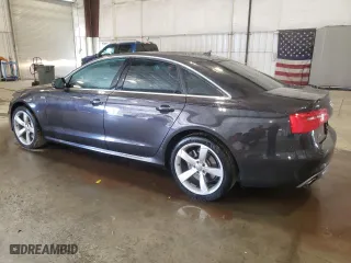 2014 Audi A6 3.0T Prestige with VIN WAUHGAFC5EN057890, listed as a Copart auction lot 49158115 with 76,424 mi miles and Salvage Title. Bid and sale history available at carsss.com. Image 2.