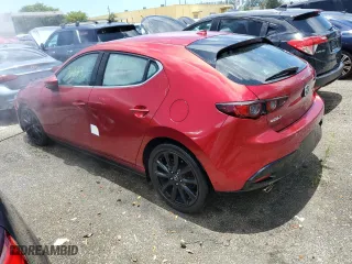 2019 Mazda Mazda3 Hatchback w/Premium Pkg with VIN JM1BPANM6K1139780, listed as a Copart auction lot 60654314 with 34,173 mi miles and Non Repairable. Bid and sale history available at carsss.com. Image 2.