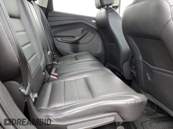 2016 Ford Escape Titanium с VIN 1FMCU9J93GUB78356, выставлен на аукционе Copart как лот 64264715 с пробегом 95 775 миль миль и Списание • Salvage title. История ставок и продаж доступна на DreamBid. Изображение 11.