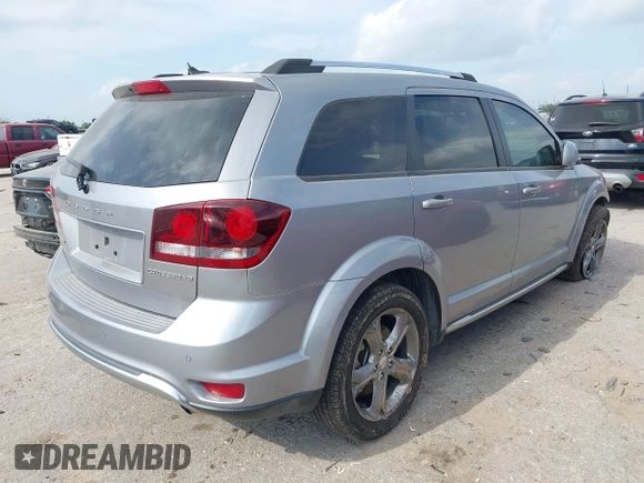 2016 Dodge Journey Crossroad Plus z VIN 3C4PDCGB0GT131602, wystawiony jako IAAI lot #42043545 z przebiegiem 102 225 mil mil oraz . Historia ofert i sprzedaży dostępna na DreamBid. Obrazek 4.