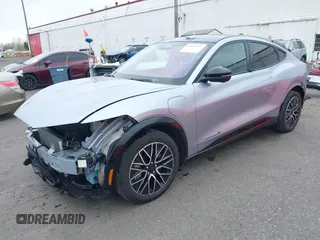 2022 Ford Mustang Mach-E Premium z VIN 3FMTK3SU4NMA04044, wystawiony jako IAAI lot #41839957 z przebiegiem 55 300 mil mil oraz . Historia ofert i sprzedaży dostępna na DreamBid. Obrazek 23.