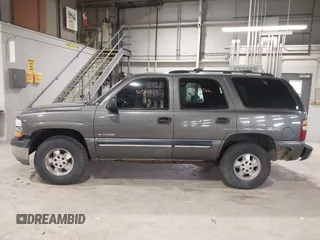 2001 Chevrolet Tahoe LT with VIN 1GNEK13T11J227454, listed as a IAAI auction lot 41513937 with 284,210 mi miles. Bid and sale history available at carsss.com. Image 6.