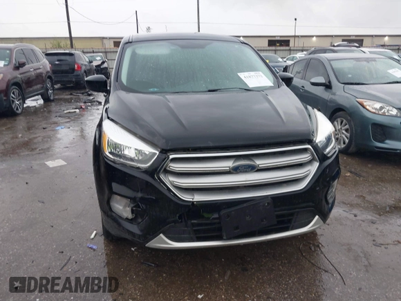 2017 Ford Escape SE with VIN 1FMCU0GD4HUE93661, listed as a IAAI auction lot 41877372 with 63,778 mi miles. Bid and sale history available at carsss.com. Image 6.