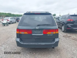 2003 Honda Odyssey EX-L z VIN 5FNRL18973B122173, wystawiony jako IAAI lot #42252018 z przebiegiem 204 487 mil mil oraz . Historia ofert i sprzedaży dostępna na DreamBid. Obrazek 17.