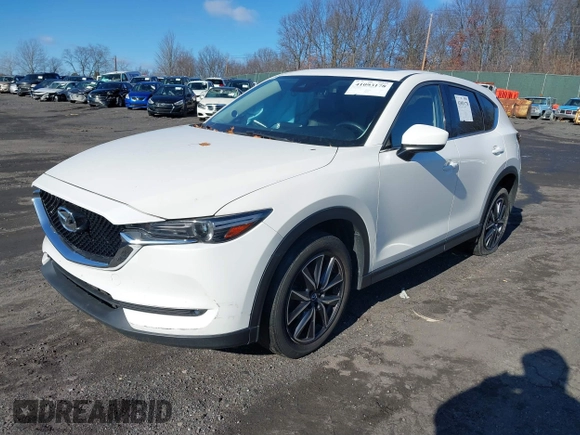 2017 Mazda CX-5 Grand Touring with VIN JM3KFBDL6H0188517, listed as a IAAI auction lot 41093178 with 98,831 mi miles. Bid and sale history available at carsss.com. Image 2.