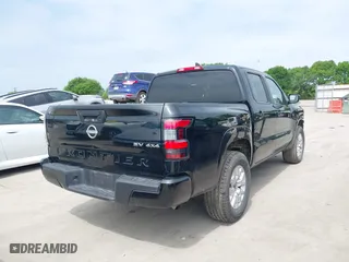 2023 Nissan Frontier PRO-4X with VIN 1N6ED1EK9PN666908, listed as a IAAI auction lot 41919897 with 35,251 mi miles. Bid and sale history available at carsss.com. Image 4.