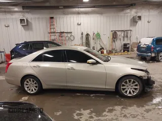 2014 Cadillac CTS Luxury AWD with VIN 1G6AX5S3XE0197628, listed as a IAAI auction lot 41400988 with 144,026 mi miles and . Bid and sale history available at DreamBid. Image 13.