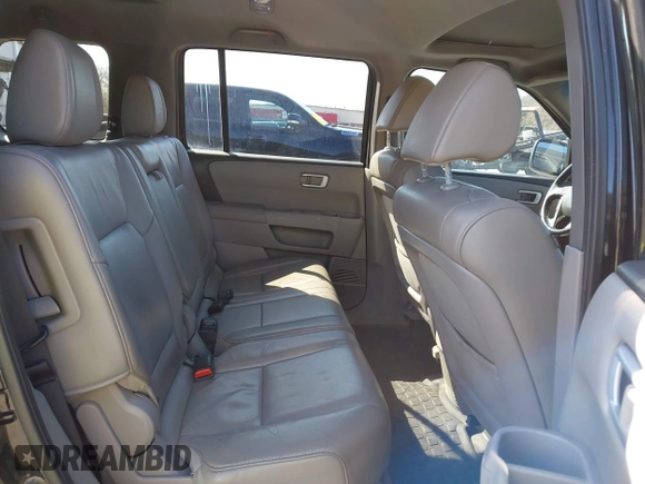 2014 Honda Pilot EX-L with VIN 5FNYF4H51EB025328, listed as a IAAI auction lot 41787439 with 169,313 mi miles and . Bid and sale history available at DreamBid. Image 8.