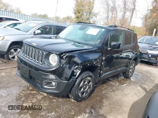 2015 Jeep Renegade Latitude with VIN ZACCJBBH2FPC25869, listed as a IAAI auction lot 40734359 with 128,475 mi miles. Bid and sale history available at carsss.com. Image 2.