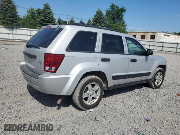 2005 Jeep Grand Cherokee Laredo with VIN 1J4GR48KX5C565762, listed as a Copart auction lot 63080115 with 122,349 mi miles and Salvage title. Bid and sale history available at DreamBid. Image 3.