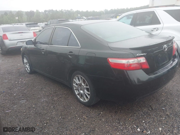 2007 Toyota Camry CE with VIN JTNBE46K573000686, listed as a IAAI auction lot 41971943 with 302,136 mi miles. Bid and sale history available at carsss.com. Image 3.