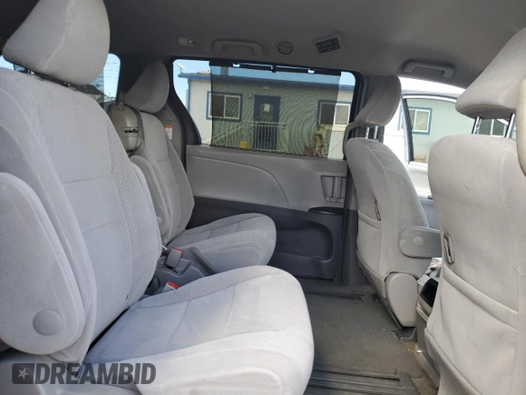 2015 Toyota Sienna LE AAS with VIN 5TDKK3DCXFS577990, listed as a Copart auction lot 56608525 with 93,323 mi miles and Salvage title. Bid and sale history available at DreamBid. Image 11.