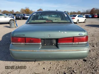 1997 Ford Crown Victoria с VIN 2FALP73W6VX173232, выставлен на аукционе Copart как лот 77805094 с пробегом 228 871 миль миль и Списание • Salvage title. История ставок и продаж доступна на DreamBid. Изображение 6.