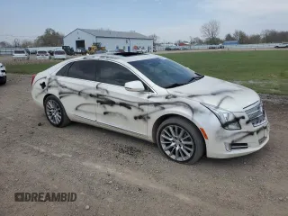 2013 Cadillac XTS Platinum z VIN 2G61V5S38D9204439, wystawiony jako Copart lot #53886495 z przebiegiem 89 940 mil mil oraz Szkody całkowita. Historia ofert i sprzedaży dostępna na DreamBid. Obrazek 4.
