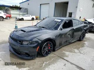 2019 Dodge Charger Scat Pack with VIN 2C3CDXGJ1KH553266, listed as a Copart auction lot 64016174 with 60,363 mi miles and Salvage Title. Bid and sale history available at DreamBid. Image 1.