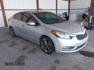 2016 Kia Forte EX with VIN KNAFX4A81G5528190, listed as a IAAI auction lot 42142075 with 162,056 mi miles. Bid and sale history available at carsss.com. Image 1.
