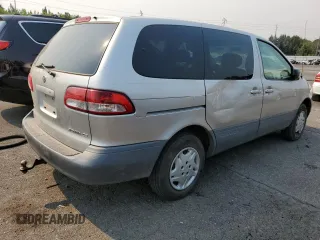 2001 Toyota Sienna CE with VIN 4T3ZF19C11U412899, listed as a Copart auction lot 70303244 with 190,025 mi miles and Salvage Title. Bid and sale history available at carsss.com. Image 3.