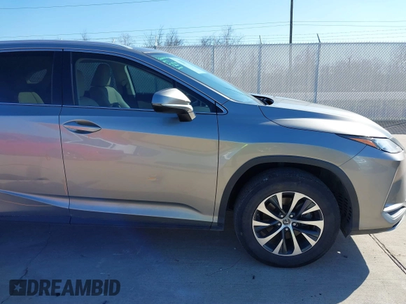 2020 Lexus RX with VIN 2T2AZMAA7LC173478, listed as a IAAI auction lot 41671494 with 91,777 mi miles. Bid and sale history available at carsss.com. Image 13.