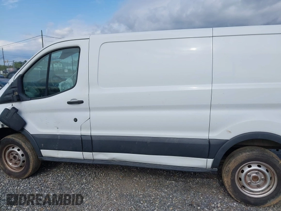 2016 Ford Transit Cargo with VIN 1FTYR1ZM2GKA38963, listed as a IAAI auction lot 42027447 with 70,659 mi miles and . Bid and sale history available at DreamBid. Image 14.