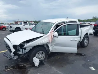 2019 Toyota Tacoma SR с VIN 5TFAX5GN0KX155401, выставлен на аукционе IAAI как лот 42753025 с пробегом 51 913 миль миль и . История ставок и продаж доступна на DreamBid. Изображение 18.