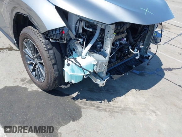 2025 Lexus NX 250 Premium z VIN 2T2GDCAZ1SC020537, wystawiony jako IAAI lot #42140775 z przebiegiem 2 349 mil mil oraz . Historia ofert i sprzedaży dostępna na DreamBid. Obrazek 19.