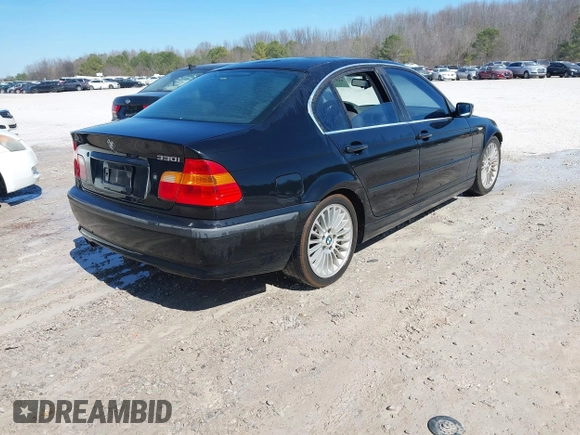 2002 BMW 3 Series 330i with VIN WBAEV53442KM20285, listed as a IAAI auction lot 41513330 with 239,374 mi miles and . Bid and sale history available at DreamBid. Image 4.