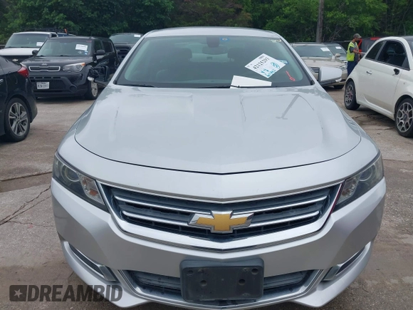 2014 Chevrolet Impala LT with VIN 2G1125S33E9103583, listed as a IAAI auction lot 42125293 with 143,951 mi miles and . Bid and sale history available at DreamBid. Image 6.
