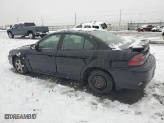 2004 Pontiac Grand Am GT with VIN 1G2NW52E14C173335, listed as a Copart auction lot 85103774 with 140,203 mi miles and Salvage Title. Bid and sale history available at carsss.com. Image 2.