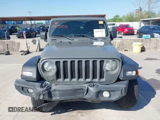 2020 Jeep Wrangler Unlimited Sport S with VIN 1C4HJXDN9LW223055, listed as a IAAI auction lot 41975355 with 61,349 mi miles and . Bid and sale history available at DreamBid. Image 13.